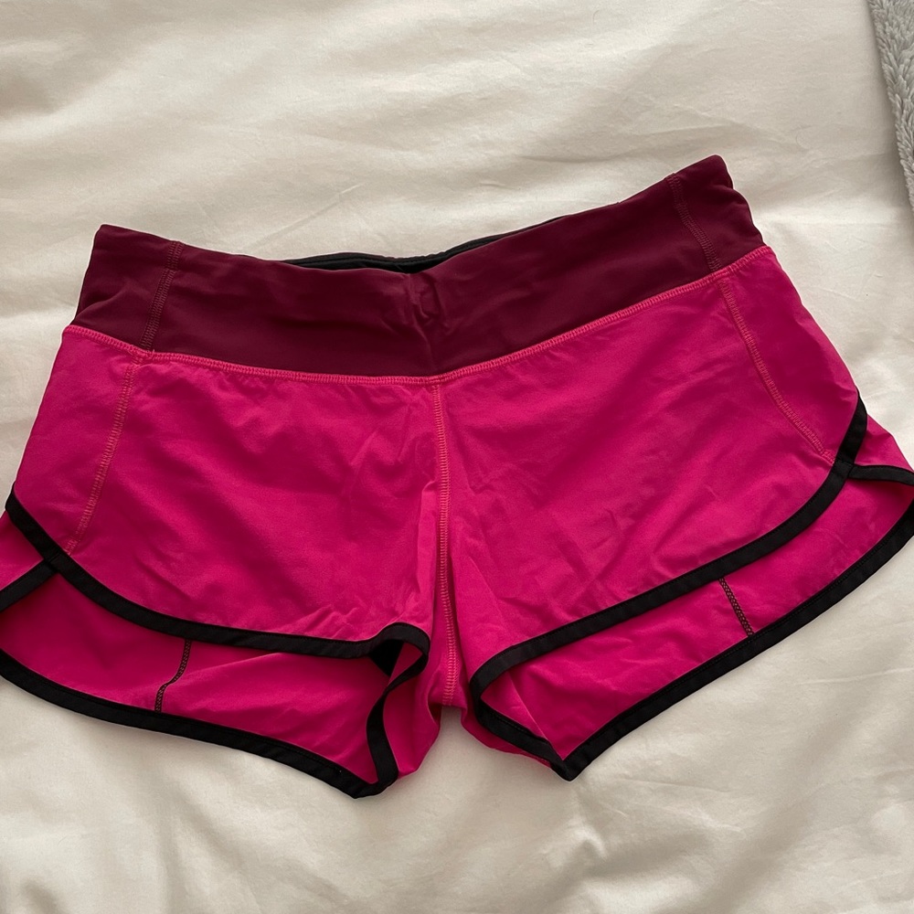 Pink lululemon running shorts